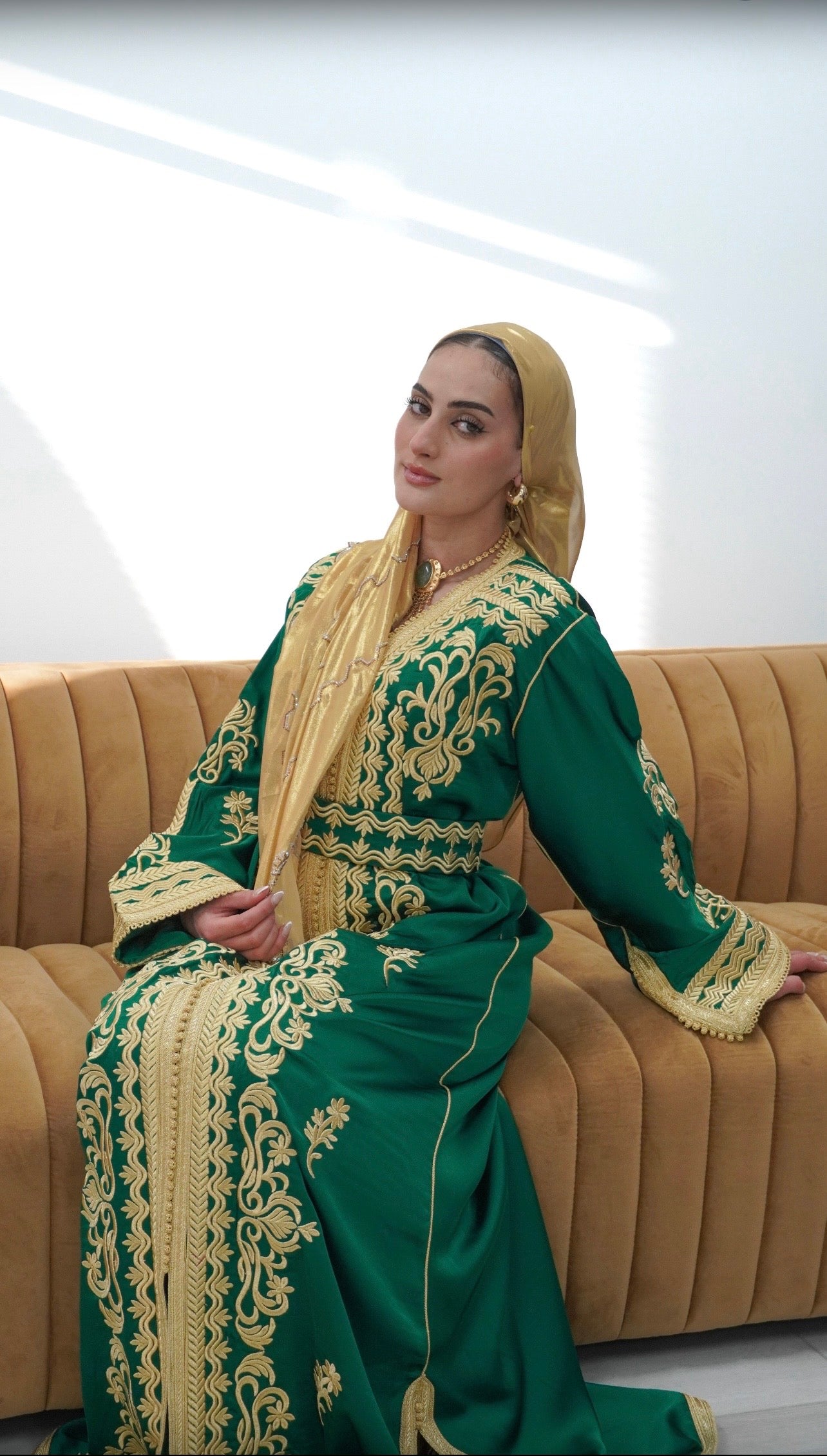 Gold Embroidered Caftan Dress Royal Green Satin Fabric Traditional Moroccan Fashion Elegant Wedding Guest Outfit Eid Celebration Dress Handcrafted Details Flowing Sleeves Design Adjustable Belt Luxury Modest Wear Special Occasion Attire