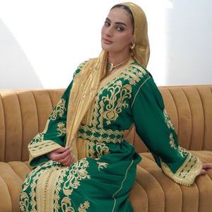 Gold Embroidered Caftan Dress Royal Green Satin Fabric Traditional Moroccan Fashion Elegant Wedding Guest Outfit Eid Celebration Dress Handcrafted Details Flowing Sleeves Design Adjustable Belt Luxury Modest Wear Special Occasion Attire