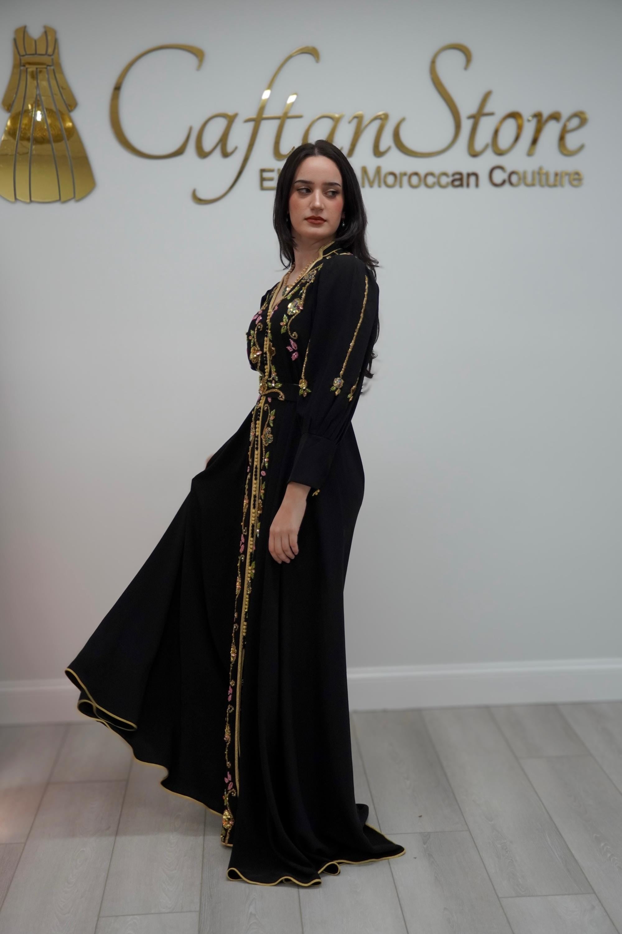 Hand Beaded Evening Gown Moroccan Caftan Style Embroidered Formal Dress Gold Threadwork Design Floral Embellishment Details Black Crepe Fabric Luxury Modest Fashion Special Occasion Dress Engagement Party Attire Cultural Celebration Gown